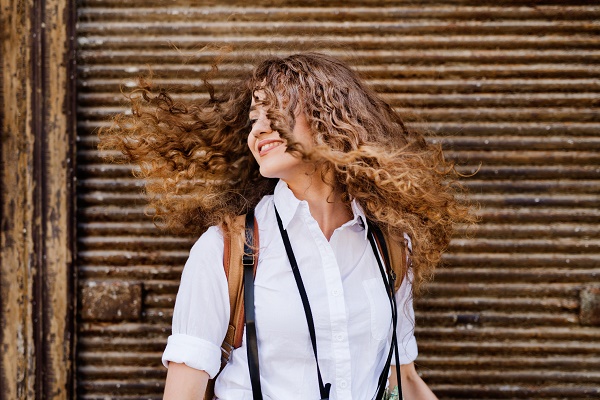 Beautiful young teenage girl in the old town.