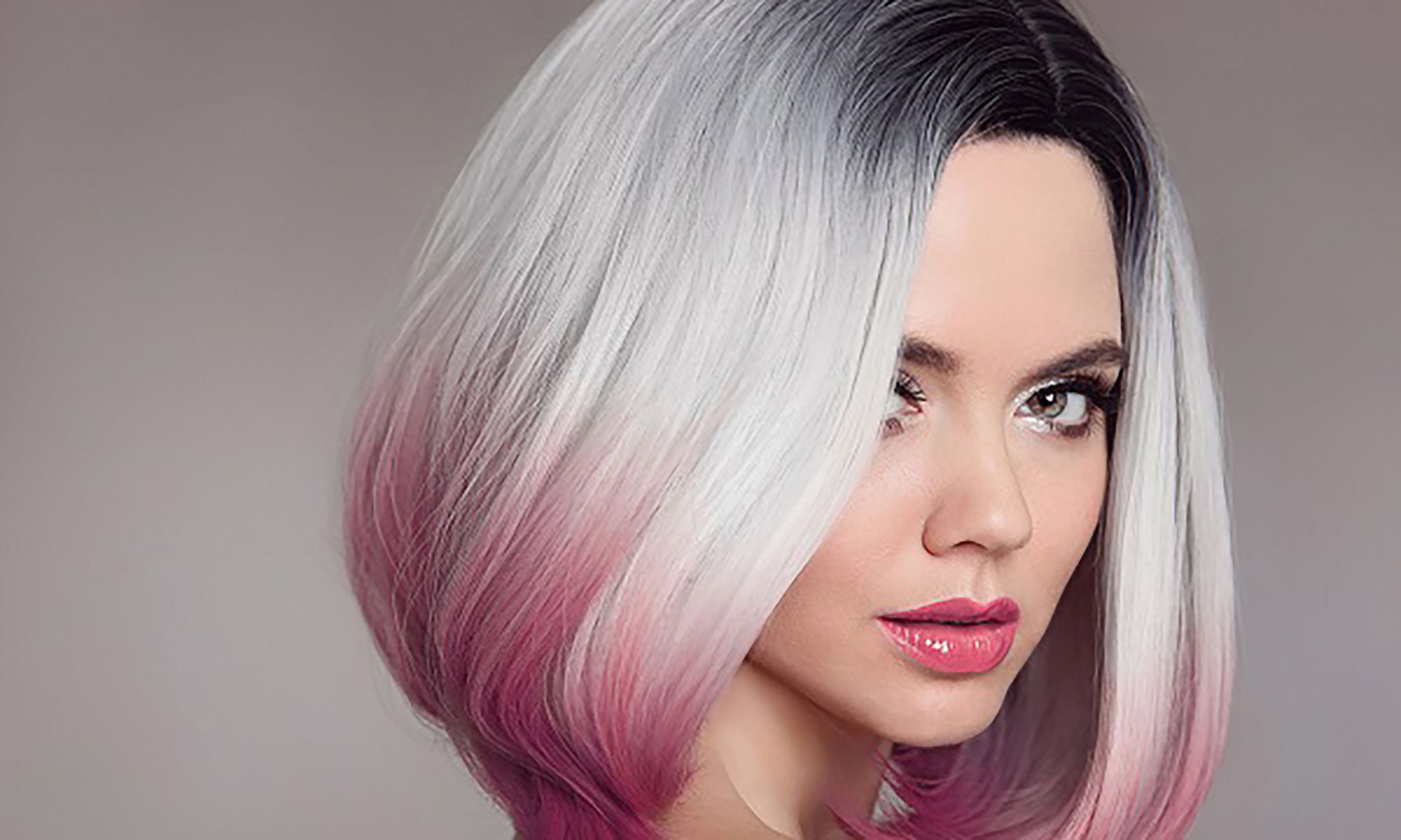 Ombre bob short hairstyle. Beautiful hair coloring woman. Fashion Trendy haircut. Blond model with short shiny hairstyle. Concept Coloring Hair. Beauty Salon.